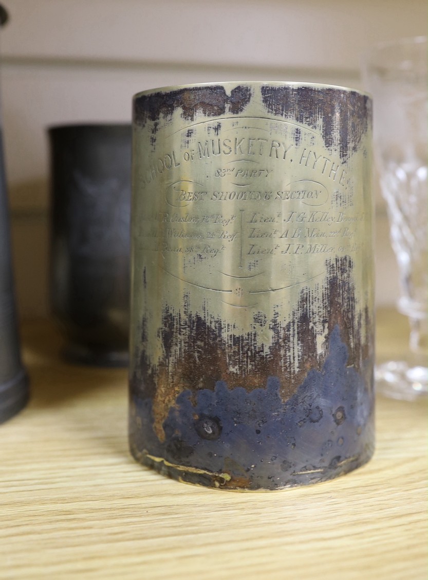 Seven pewter tankards relating to shooting clubs and artillery volunteers, and a smaller similar silver plated mug, tallest 21cm